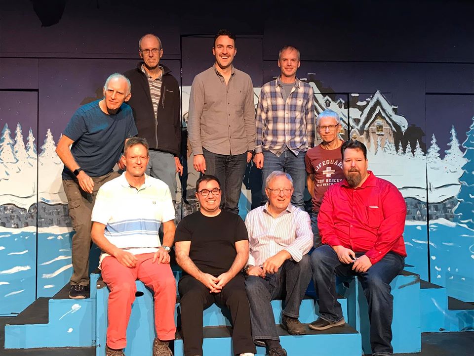 Larry Gifford and friends, onstage during improvisational comedy training.