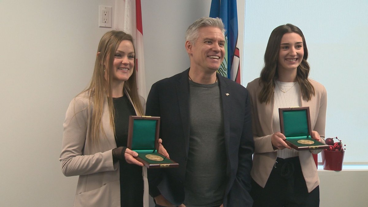 Sommer Marie King (L) and Rebecka Blackburn (R), were presented with Carnegie Medals by MP Mike Lake on Sunday, Dec. 15, 2019. 