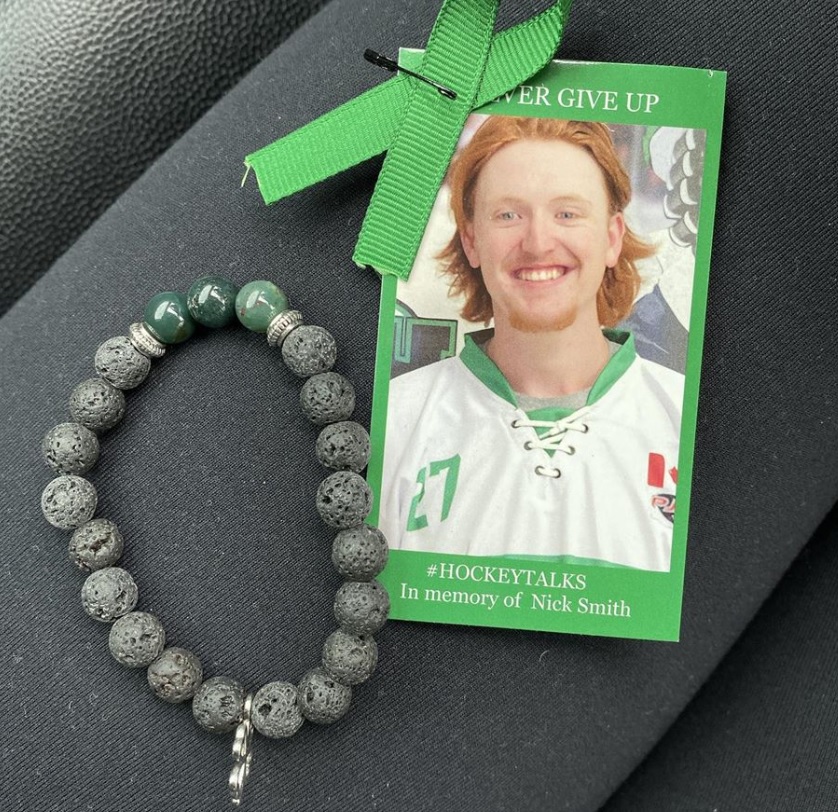 Green ribbons and bracelets are being sold to raise money for mental health initiatives in honour of Nick Smith, who died by suicide in October.