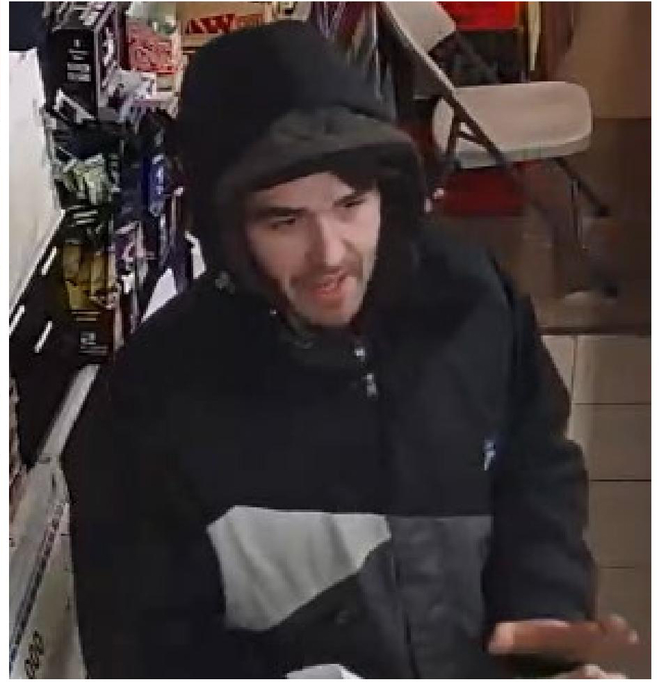 Peterborough police are looking to identify this man, one of two following a reported convenience store robbery on Dec. 12.