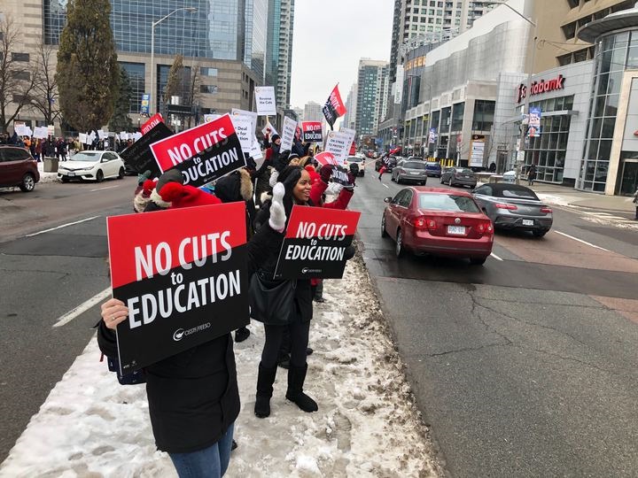 Ontario's public high school teachers protest outside TDSB offices on a one-day strike/.