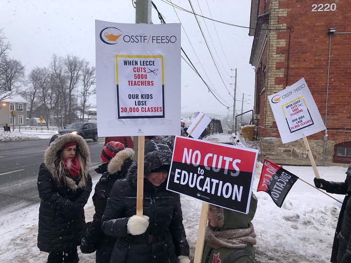 Some of Ontario's public high school teachers hold their third, one-day strike outside Education Minister Stephen Lecce's office in King City.