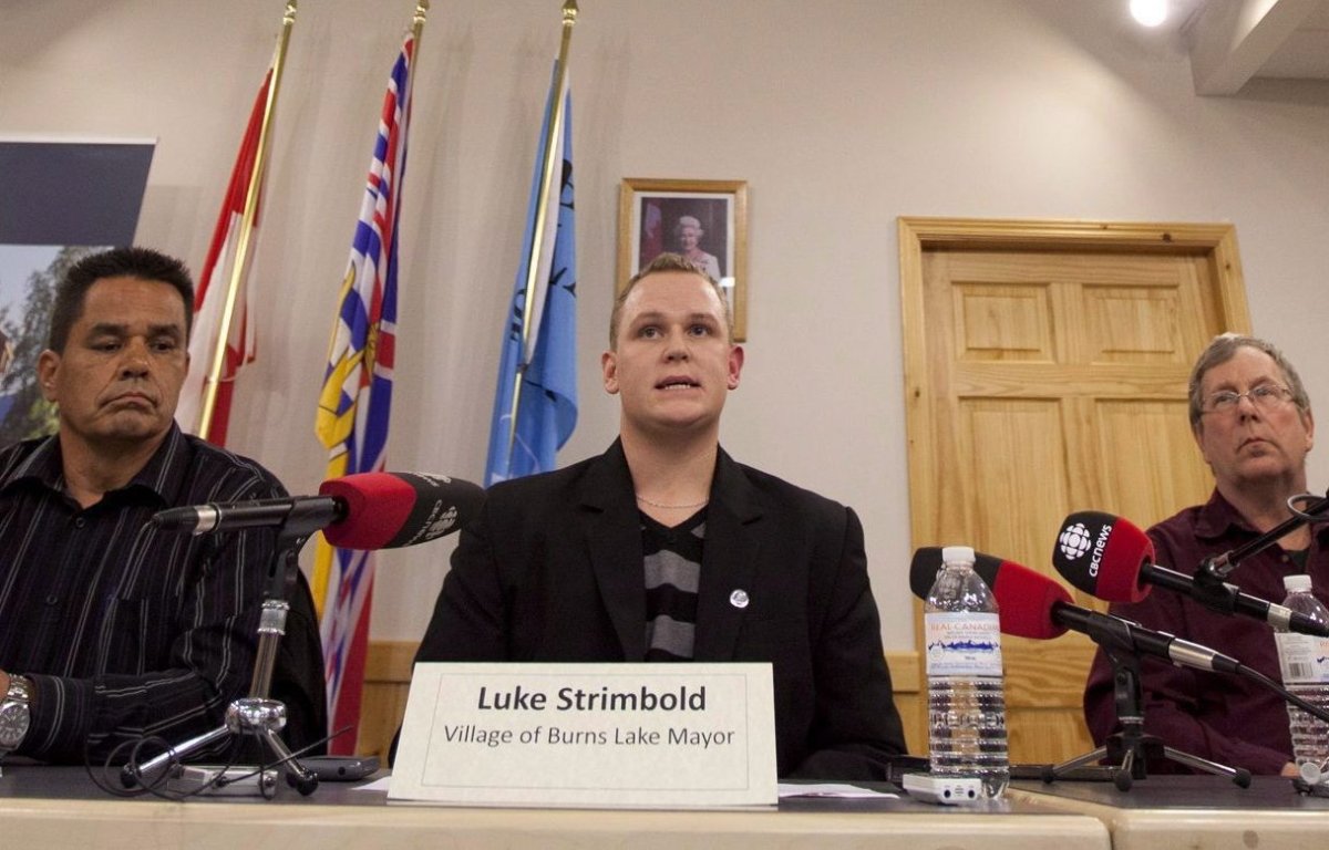 Luke Strimbold, mayor of the Village of Burns Lake addresses the media during a news conference as he responds to the explosion at Babine Forest Products mill in Burns Lake, B.C. Saturday, Jan. 21, 2012. A man who became British Columbia's youngest elected mayor has been sentenced to prison for four counts of sexual assault involving four boys who were under the age of 16.