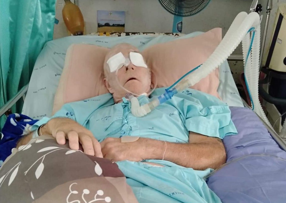 Dan Treacher, a 66-year-old Vancouver Island native, lies in hospital with a head injury he sustained at his wife's home in Thailand.