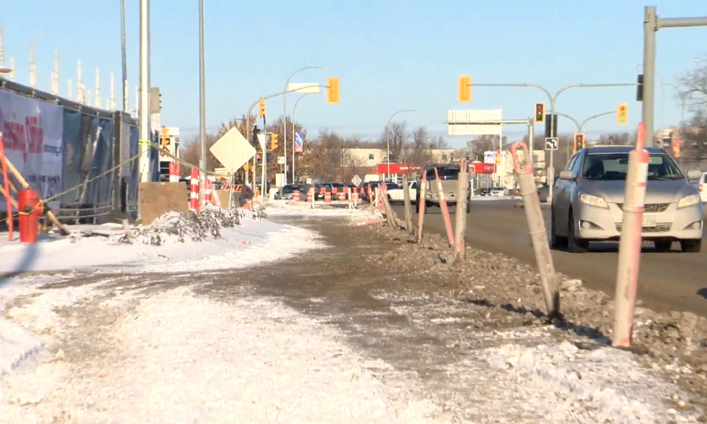 Lanes of Pembina Highway have been closed since fire tore through a building at the corner of Bison Drive Dec. 21.