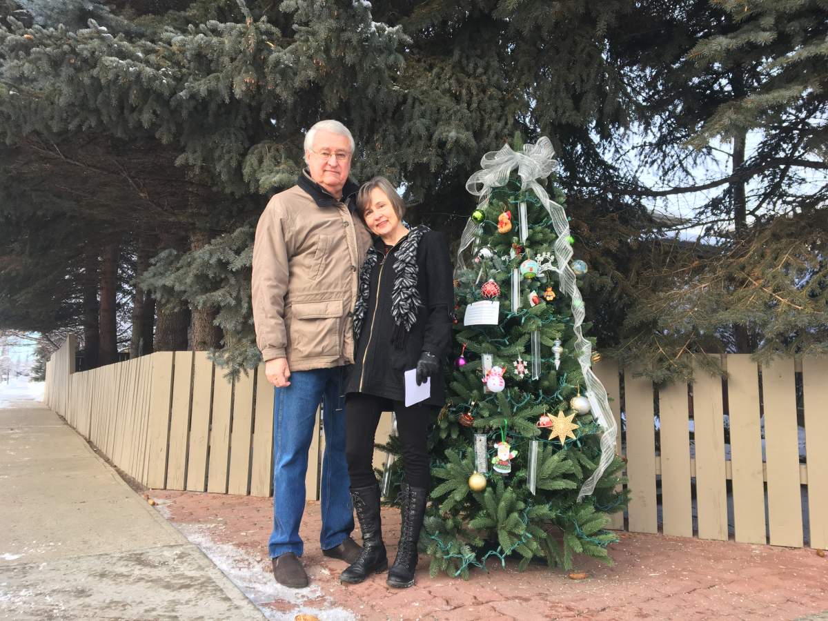 The Calgary couple is overwhelmed by the response to the community tree.