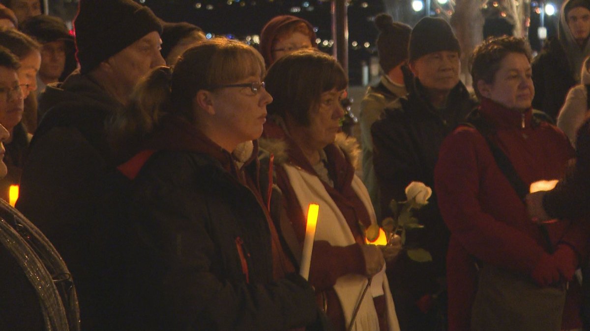 Dozens of people attended a vigil in Kelowna for the victims of the Montreal massacre. 