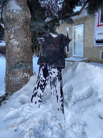 Nikki Wright and her daughter put clothes outside on Jan. 15, 2020.