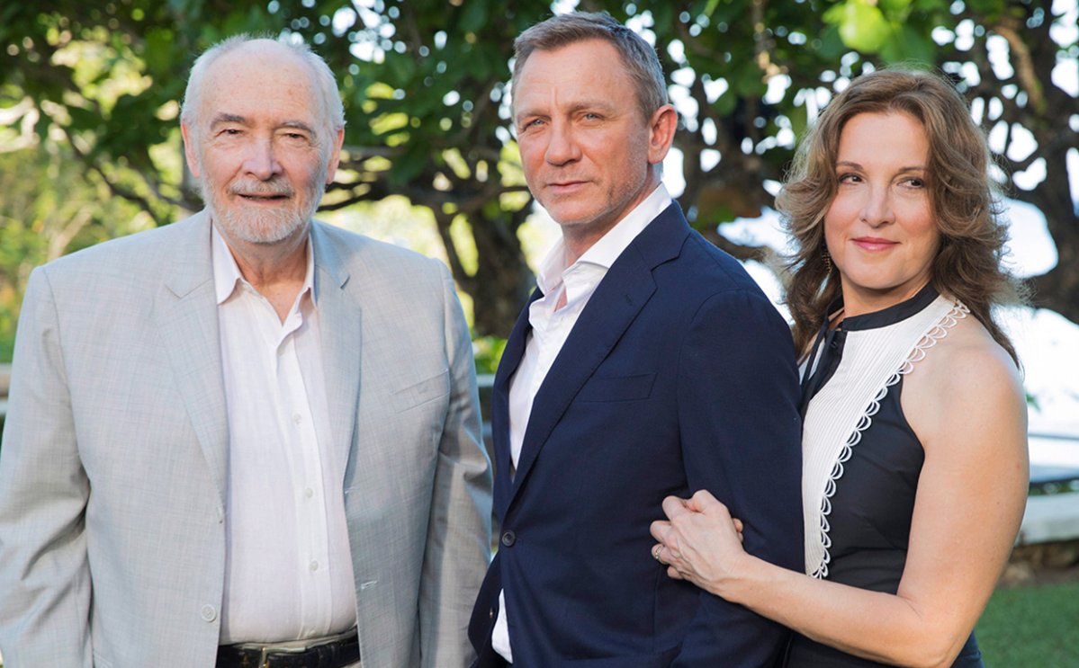 Producers Michael G. Wilson, left, and Barbara Broccoli, right, pose for photographers with actor Daniel Craig, centre, during the photo call of 'No Time to Die' in Oracabessa, Jamaica, on Thursday, April 25, 2019.