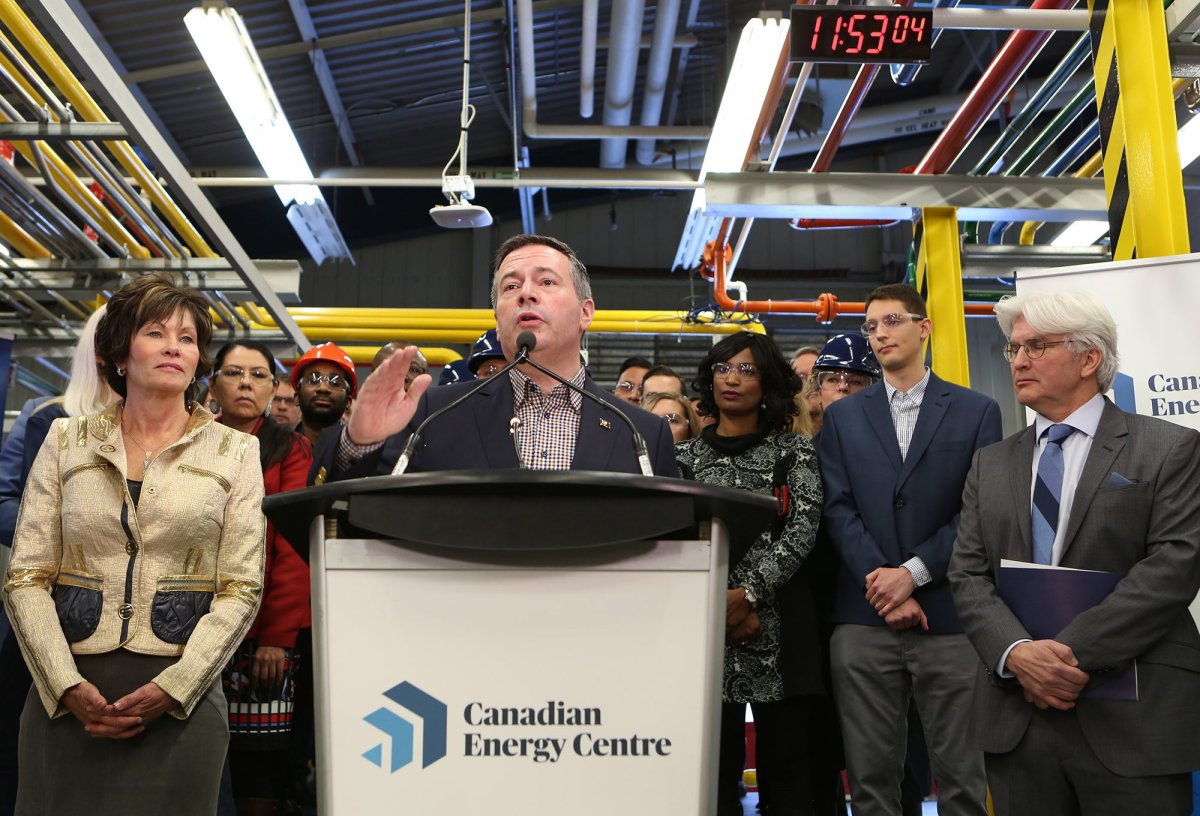 Alberta Premier Jason Kenney, centre, addresses attendees at a press conference to announce the launch of the Canadian Energy Centre at SAIT in Calgary, Alta., Wednesday, Dec. 11, 2019. 