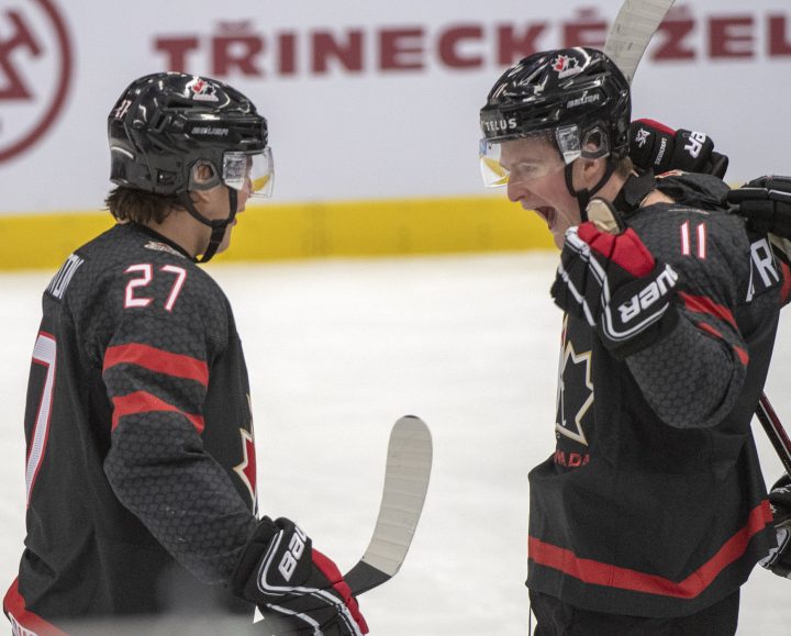 Canada's Barrett Hayton, left celebrates with teammate Alexis Lafreniere after scoring the first goal against Slovakia during first period quarterfinal action at the World Junior Hockey Championships on Thursday, Jan. 2, 2020 in Ostrava, Czech Republic.