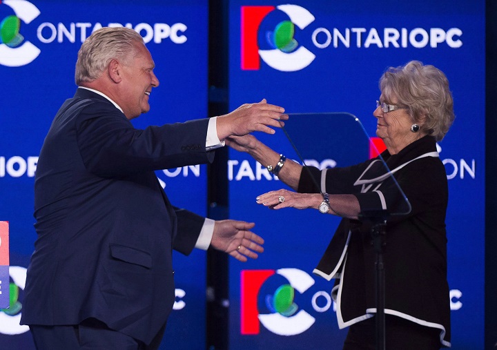 Ontario PC leader Doug Ford, left, hugs his mother Diane after winning the Ontario Provincial election to become the new premier in Toronto, on June 7, 2018.