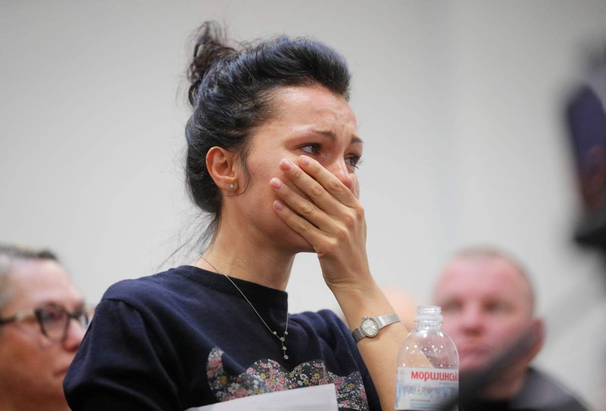 An employee of the Ukraine International Airlines (UIA) company reacts during a press conference at Boryspil International Airport in Kiev, Ukraine, 08 January 2020. According to media reports on 08 January 2020, a Ukraine International Airlines Boeing 737-800 plane crashed soon after takeoff near Imam Khomeini Airport in Tehran, Iran. Over 170 people were thought to be on the plane, and reports state that all passengers and crew were killed in the crash.