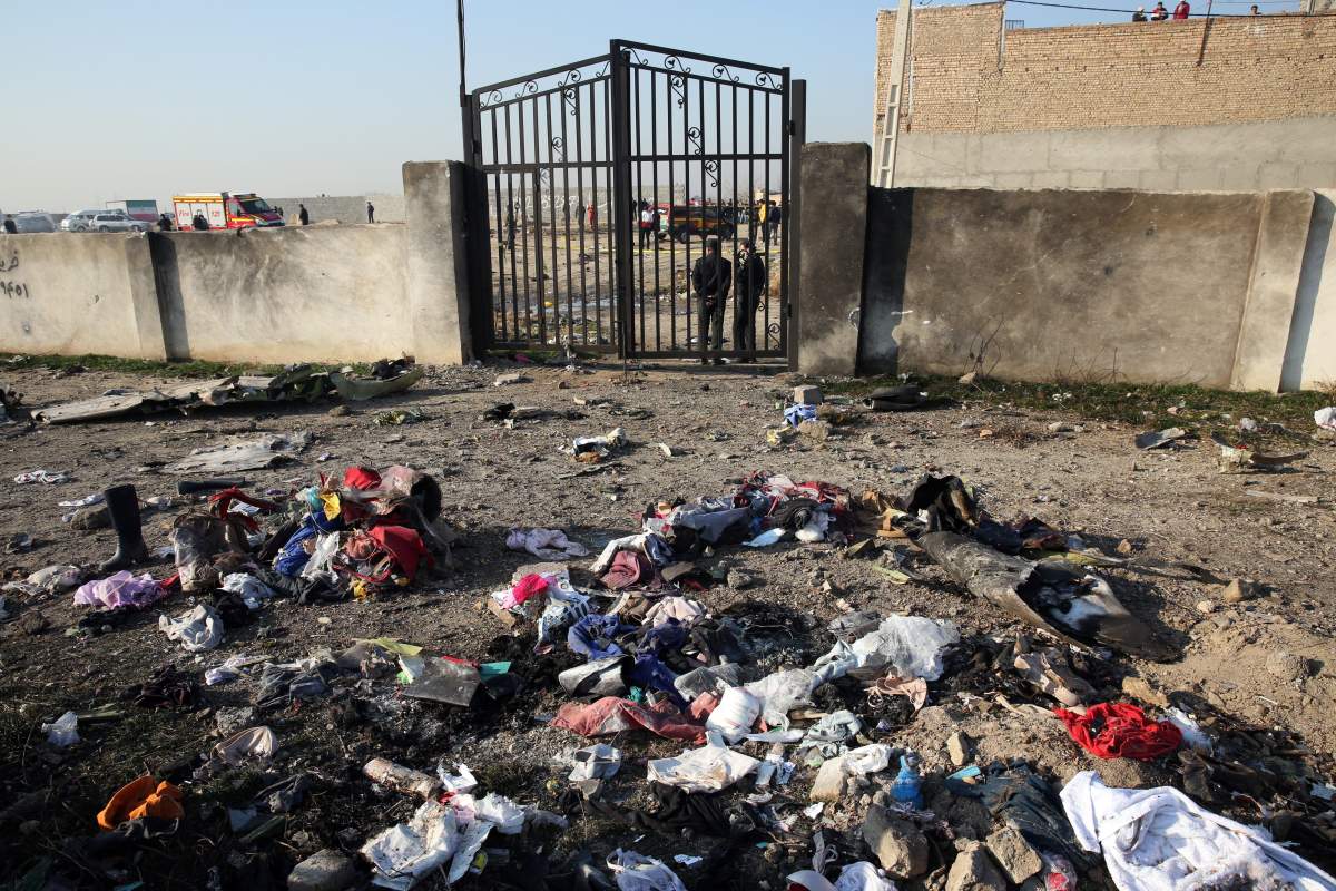 A view of victims possessions around the wreckage after an Ukraine International Airlines Boeing 737-800 carrying 176 people crashed near Imam Khomeini Airport in Tehran, killing everyone on board; in Shahriar, Iran, 08 January 2020.