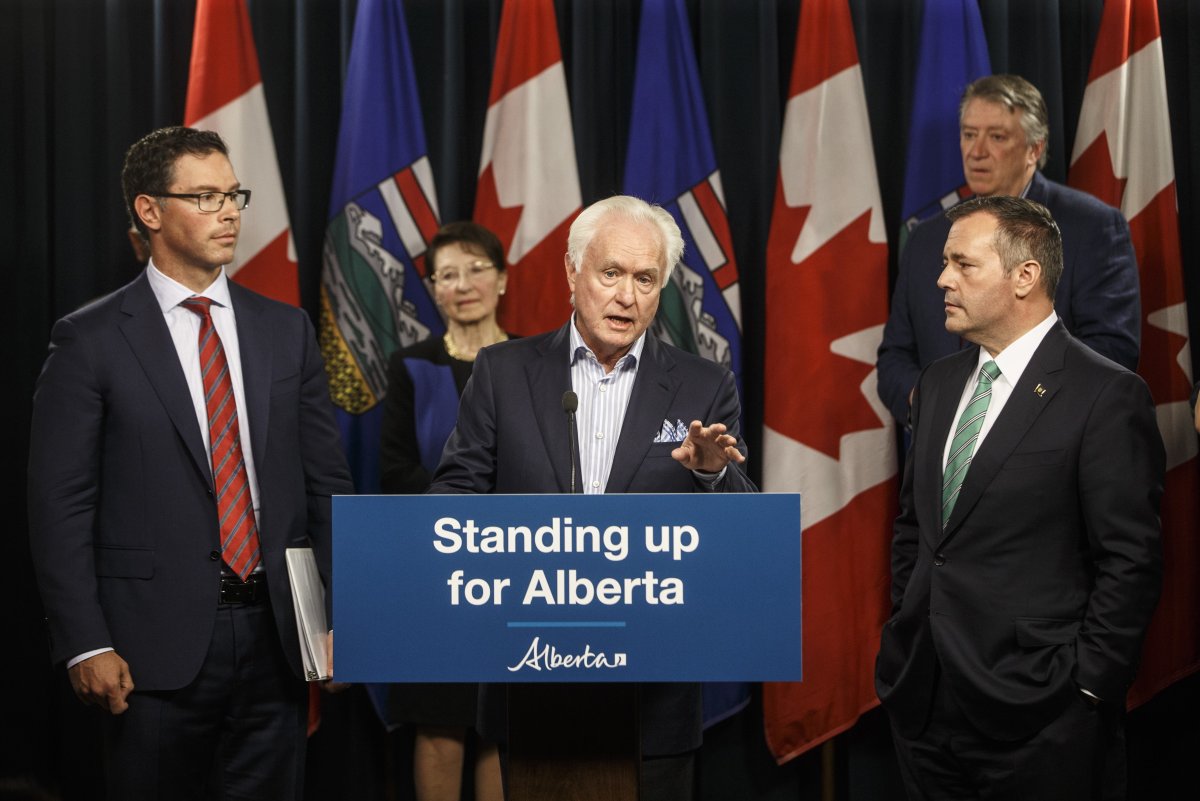 Senator Douglas Black speaks after Alberta Premier Jason Kenney, right and Doug Schweitzer, Minister of Justice and Solicitor General, provide details about Bill 13, the Alberta Senate Election Act., in Edmonton on Wednesday June 26, 2019. 
