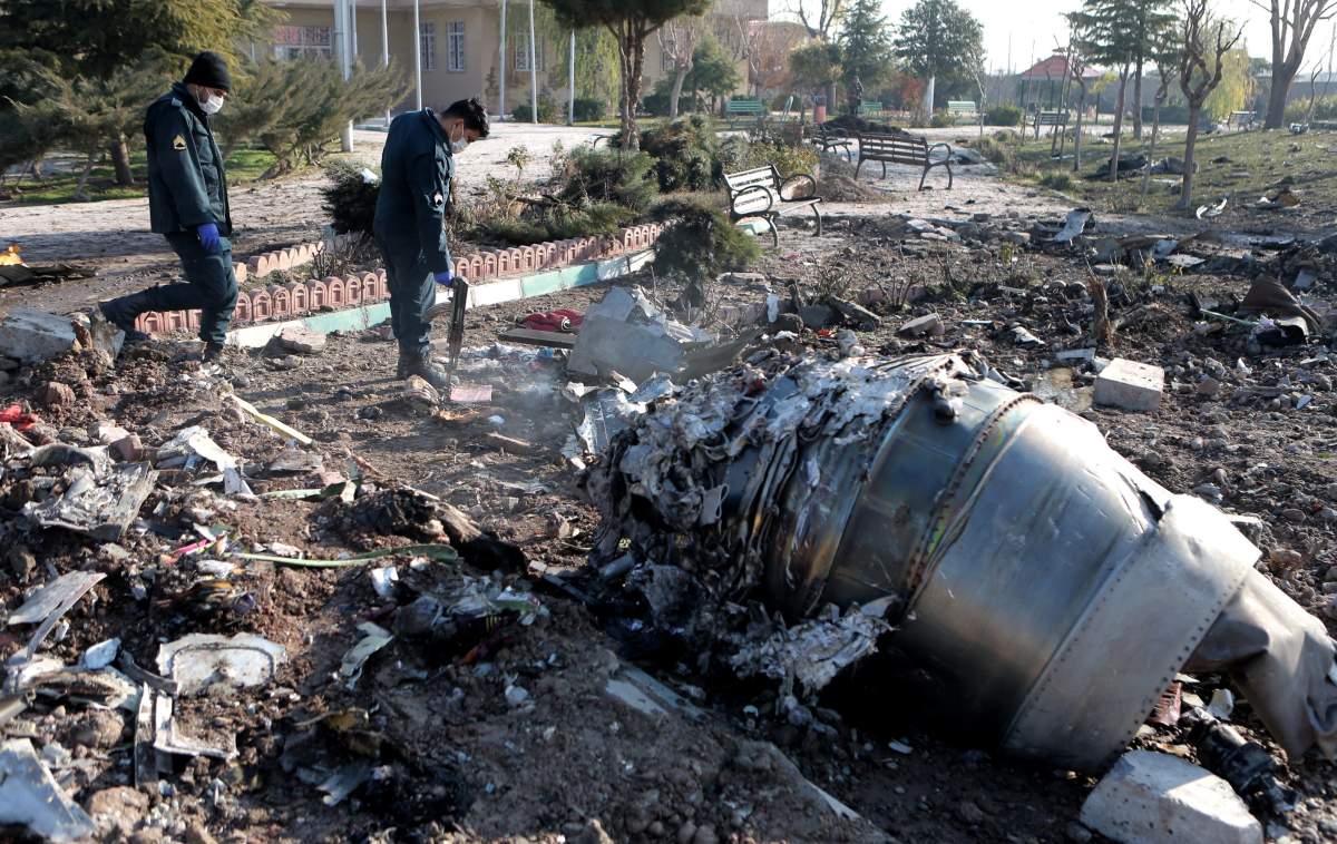 Jan. 8, 2020, Tehran, Iran: Rescuers work at the air crash site of a Boeing 737 Ukrainian passenger plane in Parand district, southern Tehran, Iran. (Credit Image: © Ahmad Halabisaz/Xinhua via ZUMA Wire)