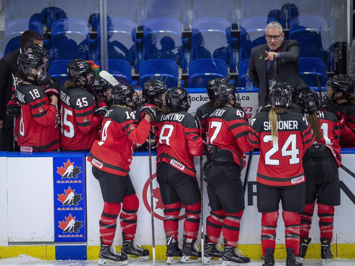 Canada head coach Perry Pearn speaks to his players as they take on Sweden during first period of 2018 Four Nations Cup preliminary game in Saskatoon, Tuesday, November 6, 2018. Pearn has been dismissed as head coach of the Canadian women's hockey team. His departure comes less than three months before the start of the women's world championship. 
