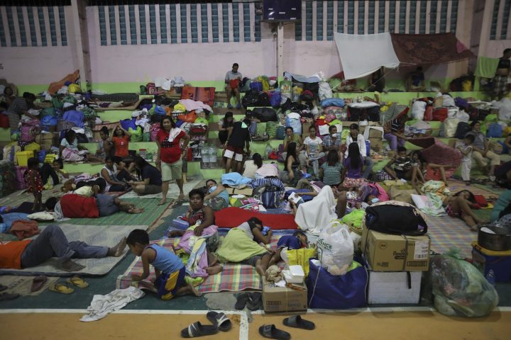 Citizens rest in an evacuation center for citizens affected by the eruption of Taal Volcano in Santo Tomas, Batangas, Philippines, 15 January 2020. 