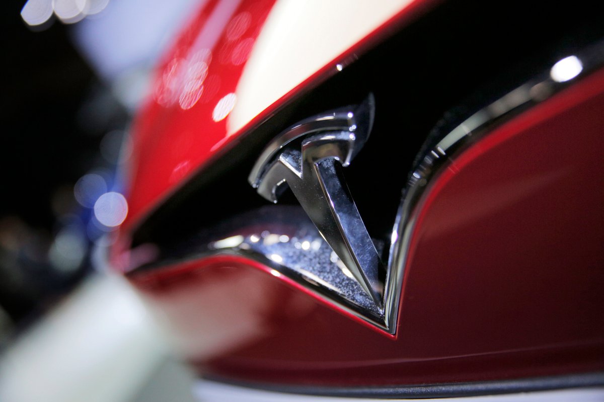 This Sept. 30, 2016, file photo shows the logo of the Tesla model S at the Paris Auto Show in Paris, France.