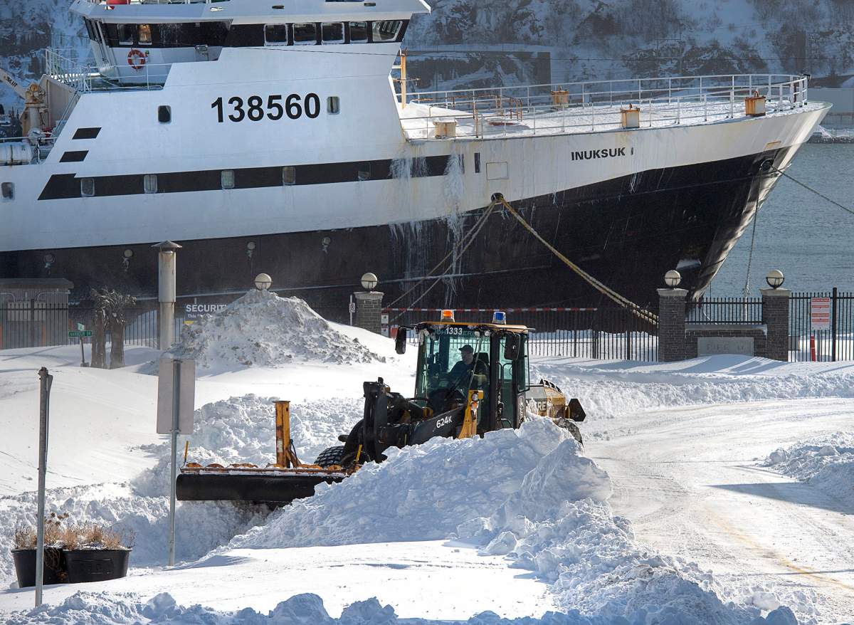 A snowplow clears the road near the waterfront in St. John’s on Saturday, Jan. 18, 2020. THE CANADIAN PRESS/Andrew Vaughan
