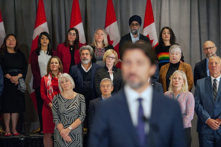FILE PHOTO: Members of the federal Liberal cabinet listen as Prime Minister Justin Trudeau answers questions from the media during the final day of the Liberal cabinet retreat at the Fairmont Hotel in Winnipeg, Tuesday, Jan. 21, 2020. 