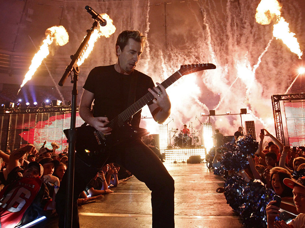 Nickelback performs during the half-time show at the 99th CFL Grey Cup Sunday Nov. 27, 2011 in Vancouver.