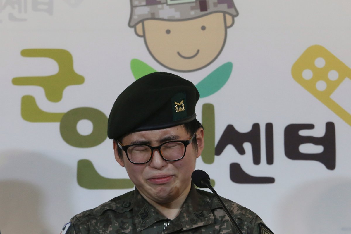 South Korean army Sergeant Byun Hui-su weeps during a press conference at the Center for Military Human Right Korea in Seoul, South Korea, Wednesday, Jan. 22, 2020.  