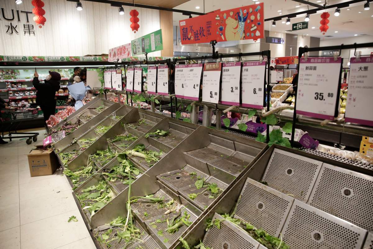 Empty vegetable stalls in a market is seen as people stock up on food due to the coronavirus outbreak in Wuhan City, Hubei Province, China, 23 January 2020. EPA/STRINGER CHINA OUT