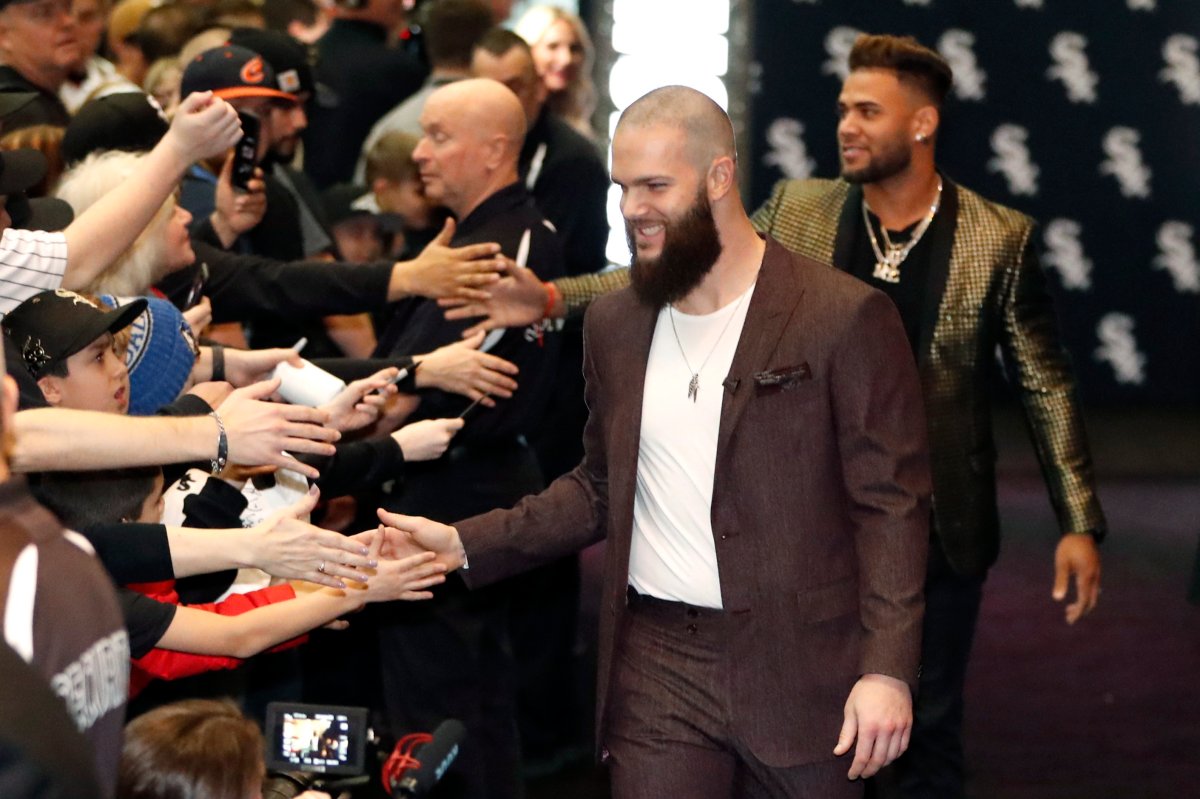 Chicago White Sox's Dallas Keuchel, center, is welcomed by fans after he was introduced during the team's annual fan convention Friday, Jan. 24, 2020, in Chicago.