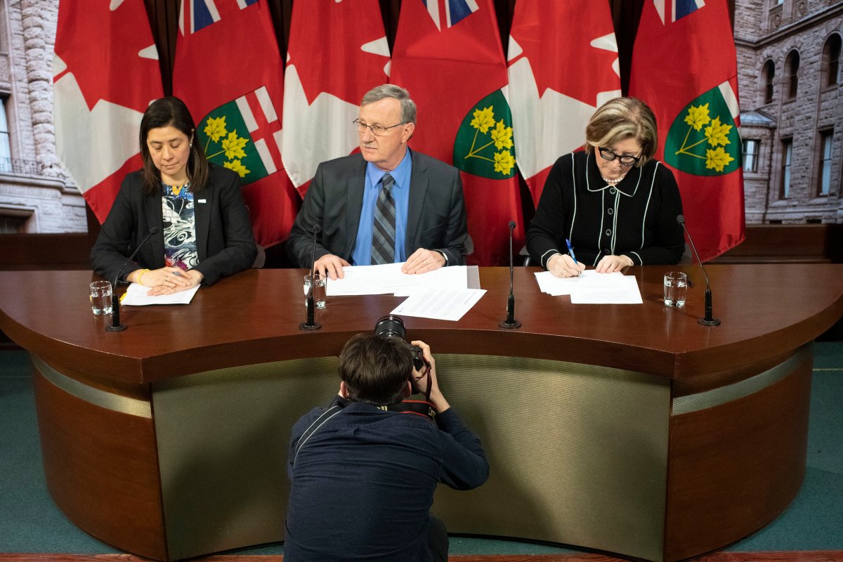 Dr. David Williams, chief medical officer of health for Ontario, centre, Dr. Barbara Yaffe, right, associate chief medical officer of health, and Dr. Eileen de Villa, medical officer of health for the City of Toronto, attend a news conference in Toronto on Monday, Jan. 27, 2020.