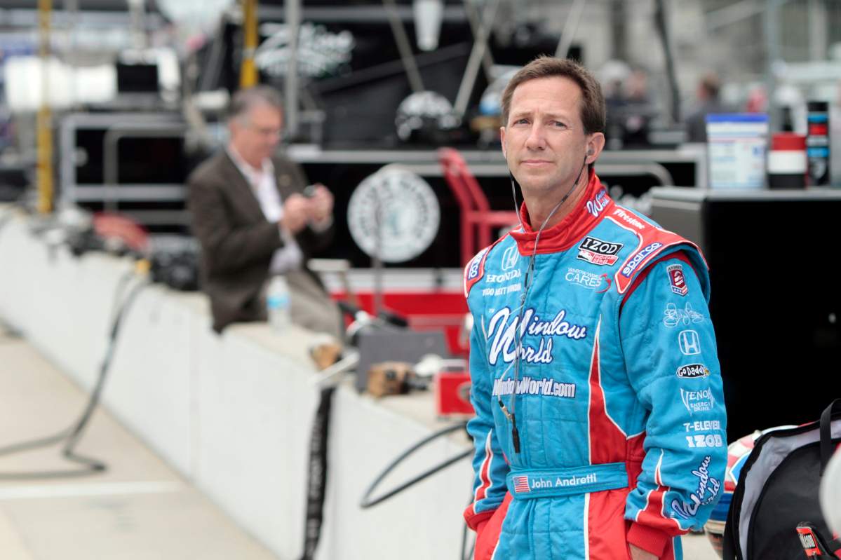 FILE - In this May 19, 2010, file photo, John Andretti watches during practice for the Indianapolis 500 auto race at the Indianapolis Motor Speedway in Indianapolis. 