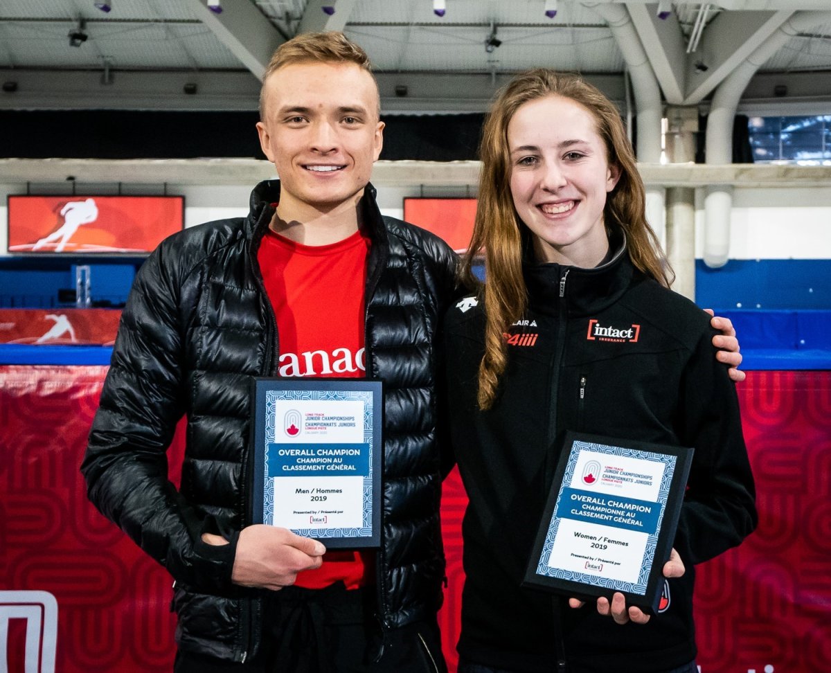 Frank Roth and Alexa Scott celebrate after being crowned overall winners at the 2020 Canadian Junior Long Track Championships at the Olympic Oval in Calgary.