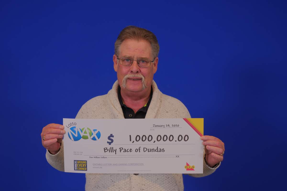 Billy Pace of Dundas showcases his $1,000,000 cheque after winning the Dec. 31, 2019 MAXMILLIONS prize.