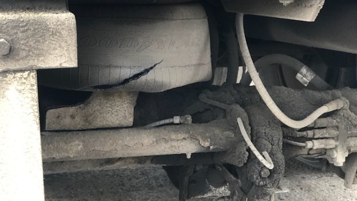 Evan Grant claims Unifor picketers have blown one of his truck’s air bag.