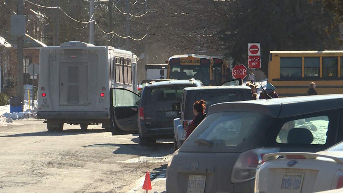 Traffic congestion in front Prince Edward Collegiate Institute, Picton