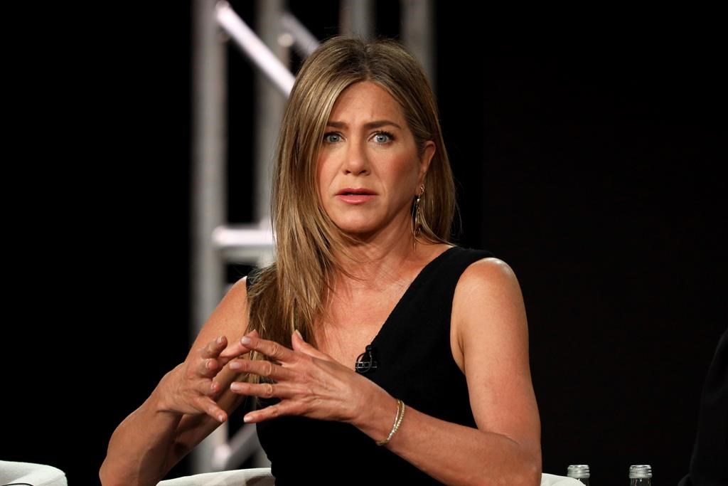 Jennifer Aniston speaks at “The Morning Show,” panel during the Apple+ TCA 2020 Winter Press Tour at the Langham Huntington, Sunday, Jan. 19, 2020, in Pasadena, Calif. (Photo by Willy Sanjuan/Invision/AP)