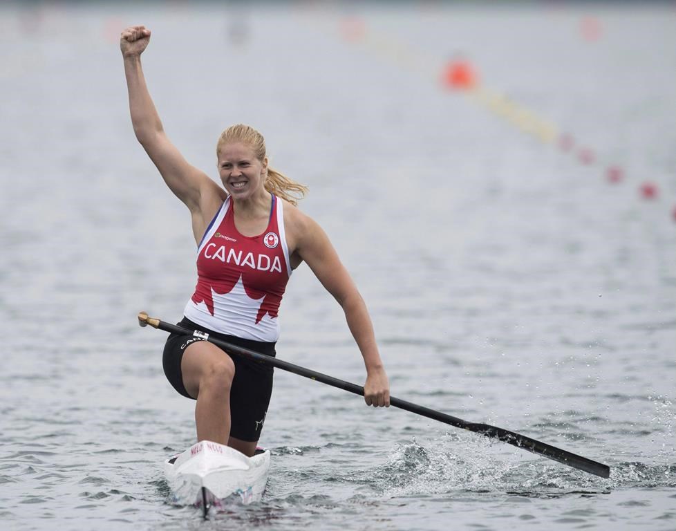 Canada's Laurence Vincent Lapointe celebrates winning the gold medal in the women's C1 200m canoe race at the 2015 Pan Am Games in Welland, Ont., Tuesday, July 14, 2015. An anti-doping panel has cleared Canadian canoeist Laurence Vincent Lapointe to return to training and competition. The panel convened by the International Canoe Federation made the decision after it accepted that Vincent Lapointe did not knowingly take Ligandrol. THE CANADIAN PRESS/Aaron Lynett.