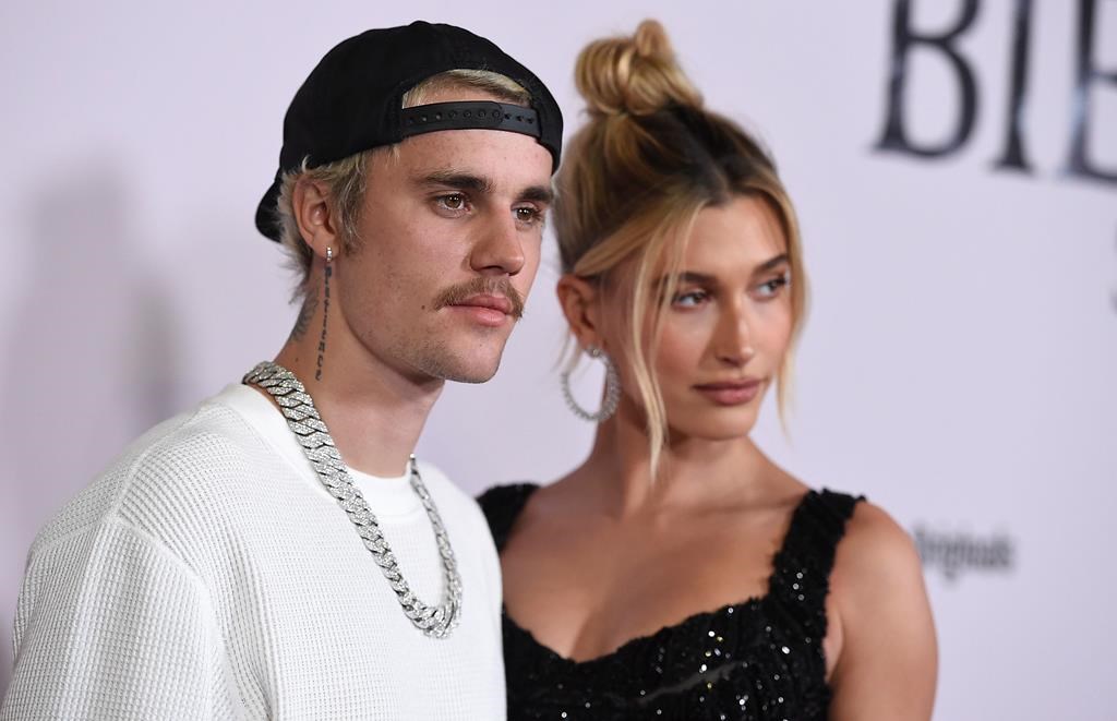 Justin Bieber and Hailey Baldwin arrive at the Los Angeles premiere of ‘Justin Bieber: Seasons,’ Monday, Jan. 27, 2020.