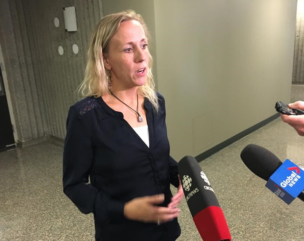 Carrie Low talks to media outside court in Halifax, Monday, Sept.16, 2019. A Halifax woman has launched a lawsuit alleging police falsely labelled her as a lying alcoholic as they mishandled her sexual assault case. Forty-three-year-old Carrie Low says in a statement of claim submitted to the Nova Scotia Supreme Court that she's seeking damages from the RCMP and the Halifax police.