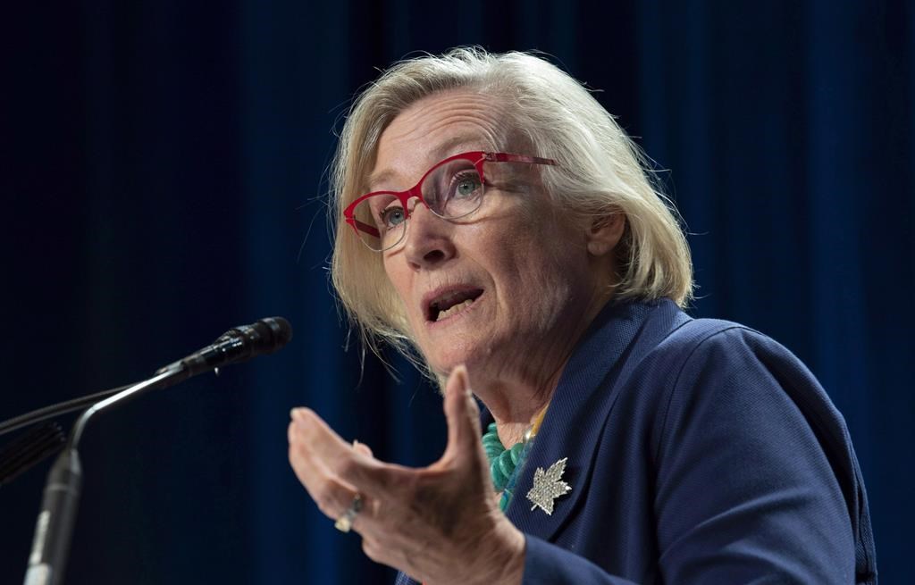 Crown-Indigenous Relations Minister Carolyn Bennett is shown in Gatineau, Que., in a September 11, 2018 file photo. A long-awaited settlement agreement to provide financial compensation to survivors of Canada's Indian day schools is now open for applications.