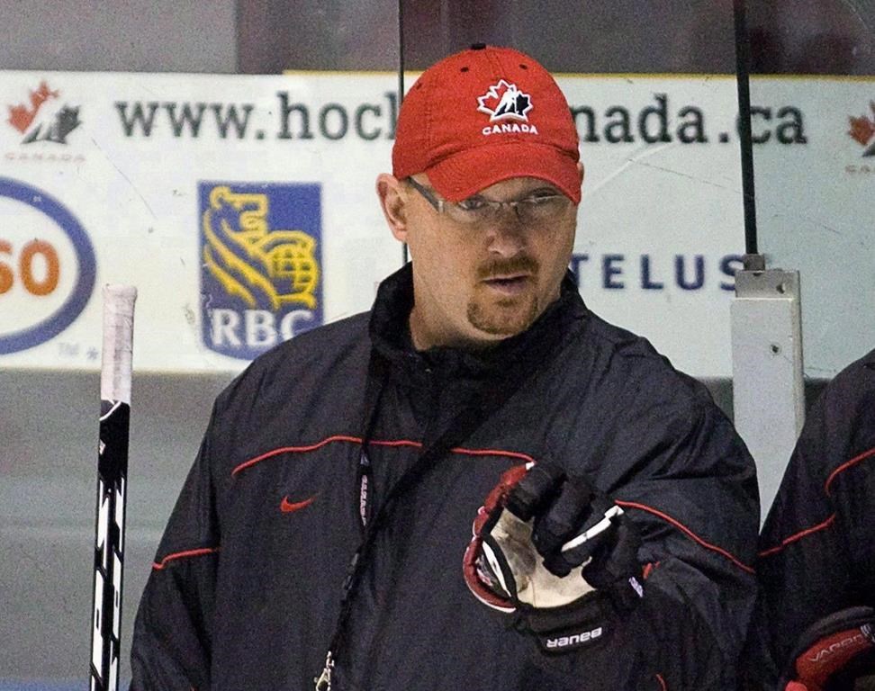 Assistant coach Andre Tourigny follows the action during practice at the national junior hockey team development camp in St. John's, N.L. on Friday, August 6, 2010. After serving as an assistant coach this year for Canada's gold medal-winning team, Andre Tourigny has earned a promotion for the 2021 world junior hockey championship.