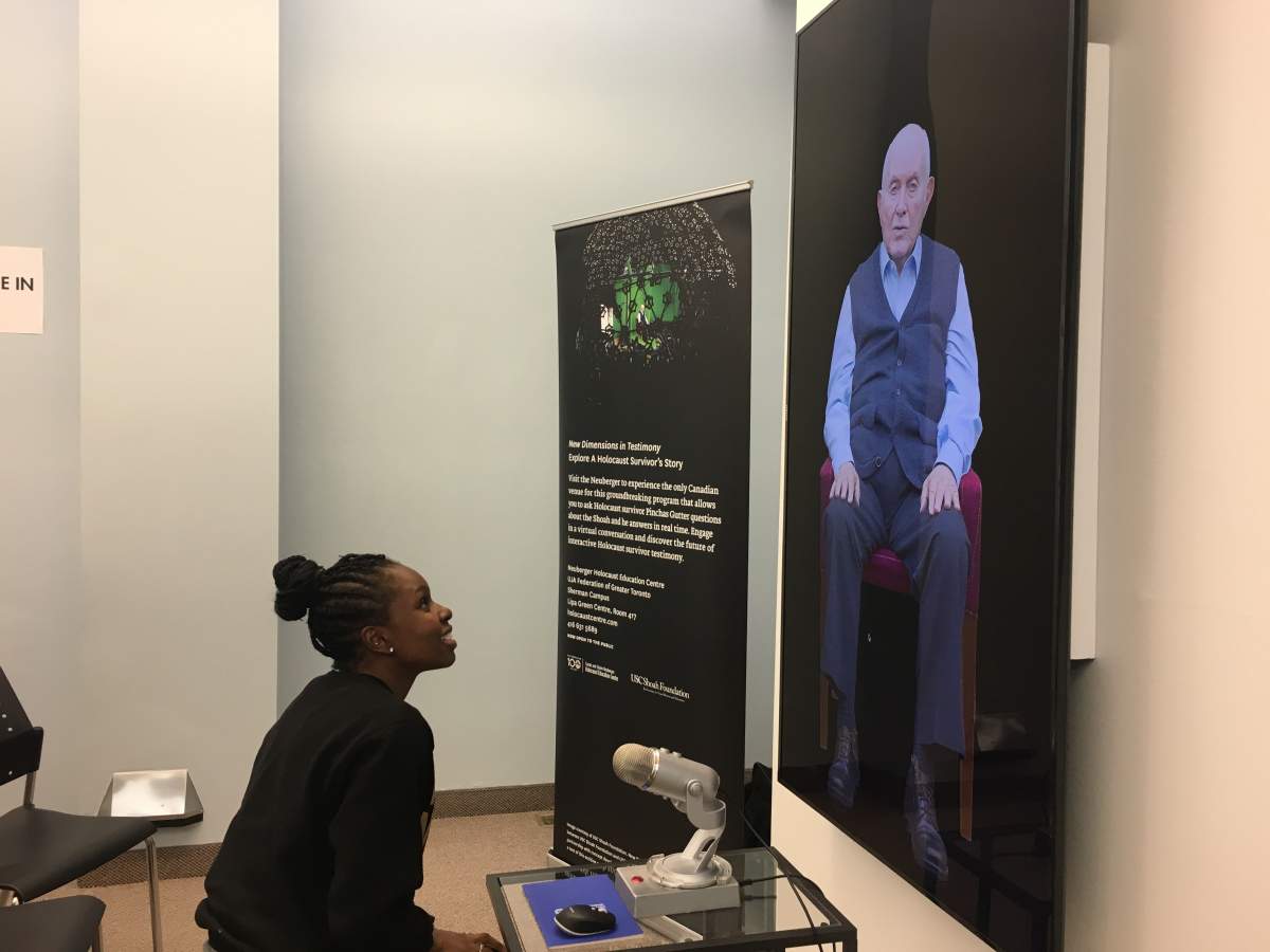 A student in Toronto interacts with USC Shoah Foundation’s Dimensions in Testimony during its second pilot at the Neuberger in 2018.