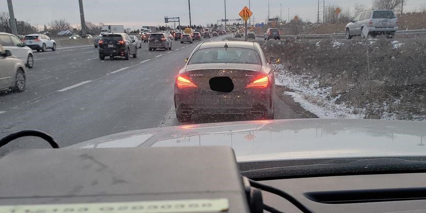 OPP says texting driver was "oblivious" to officer walking toward them .