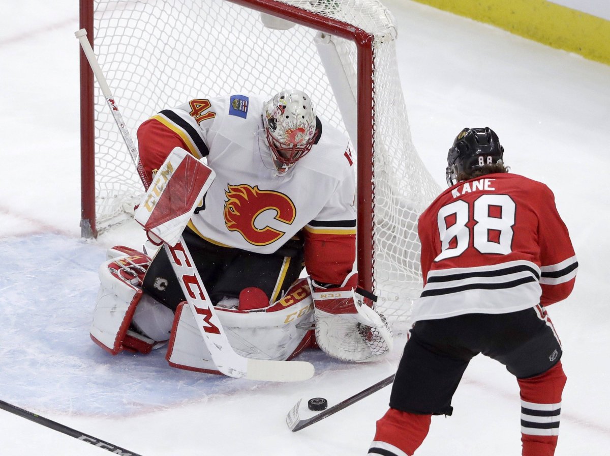 Patrick Kane of the Chicago Blackhawks takes a shot on the Calgary Flames net in a game played on February 6, 2018.
