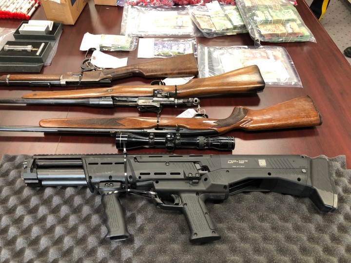 Weapons seized during a drug bust in Prince Albert, Sask., involving members of the FreeWheelers motorcycle gang.