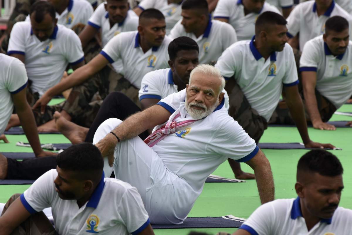 Indian Prime Minister Narendra Modi performs yoga during a mass yoga event on International Yoga Day in Ranchi in eastern Jharkhand state June 21, 2019. (Photo by ) (Photo credit should read RAJESH KUMAR/AFP via Getty Images)