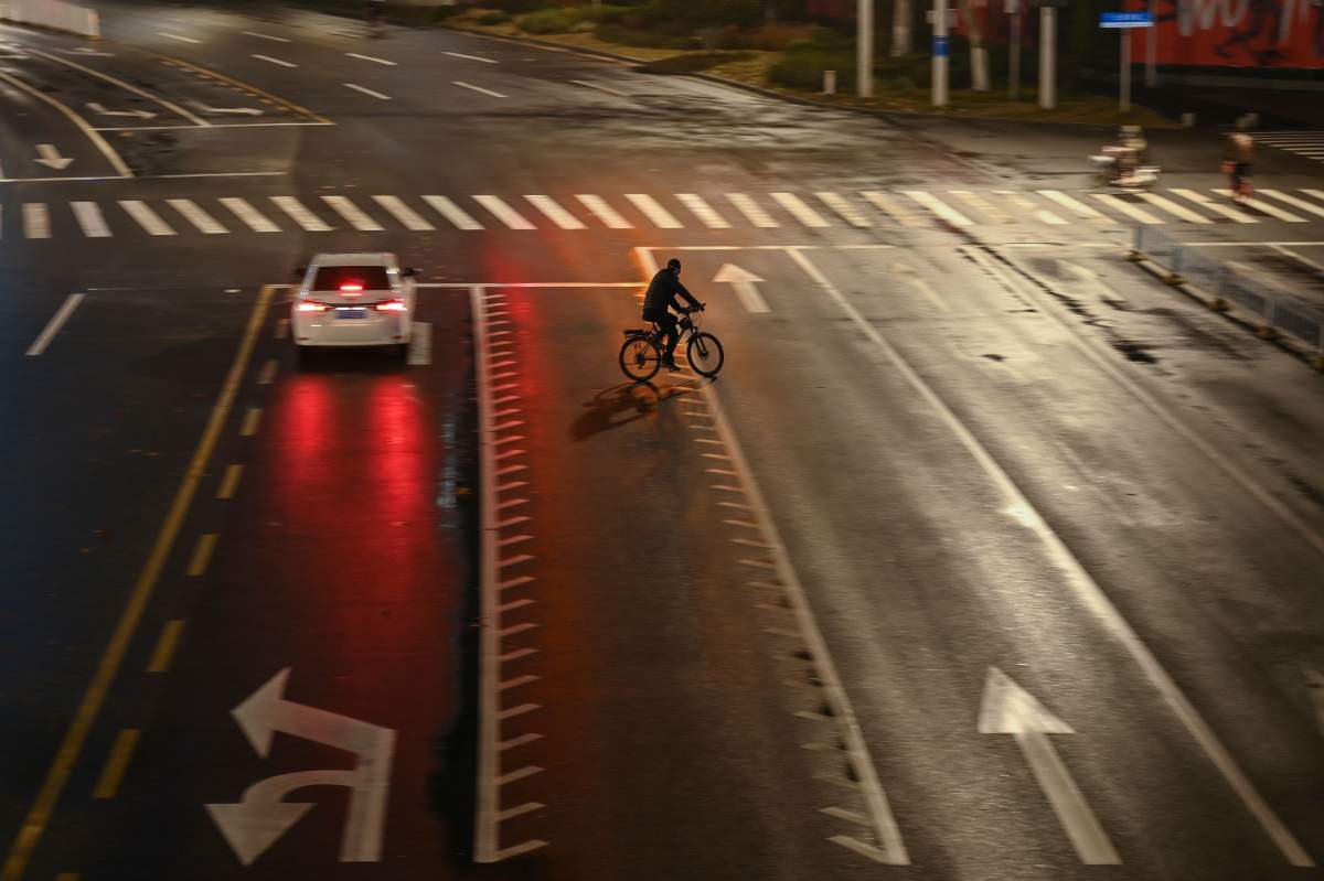 General view of a street in Wuhan on Jan. 26, 2020, a city at the epicentre of a viral outbreak. (Photo by HECTOR RETAMAL/AFP via Getty Images)