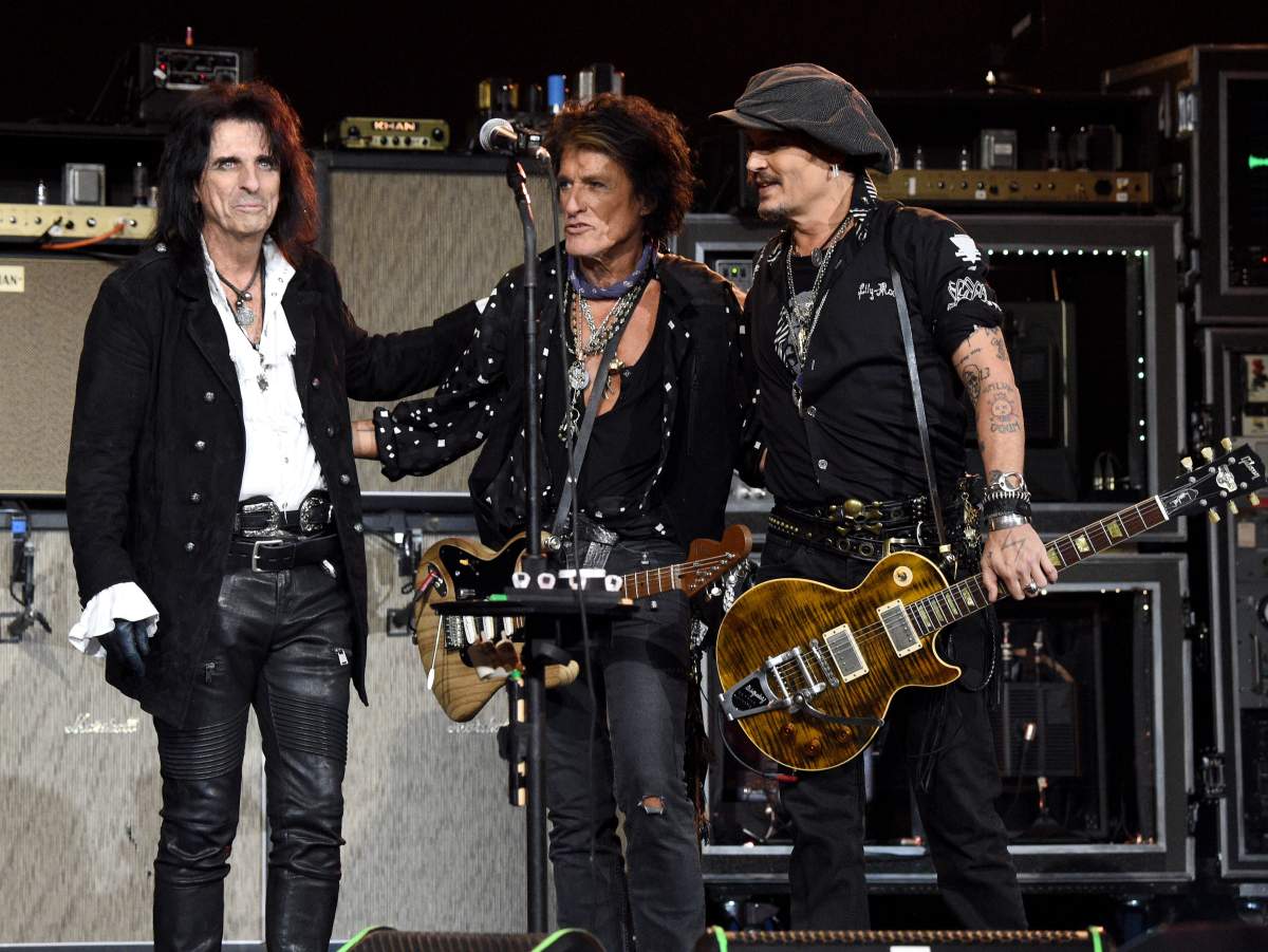 (L-R) Alice Cooper, honouree Joe Perry of music group Aerosmith and Johnny Depp perform onstage during MusiCares Person of the Year honoring Aerosmith at West Hall at Los Angeles Convention Center on Jan. 24, 2020, in Los Angeles, Calif.