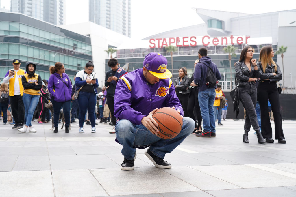 Los Angeles Lakers fan Victor Chavez, 30, of Los Angeles, mourns the death of retired NBA star Kobe Bryant outside the Staples Center prior to the 62nd Annual Grammy Awards on Jan. 26, 2020.