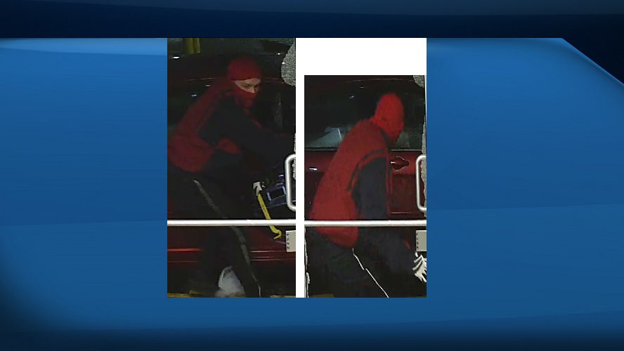 One suspect is described as wearing a red balaclava, a red-and-navy jacket and black-and-white gloves.